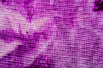 Close up of purple tie dye fabric texture