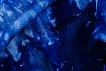 Blue tie dye fabric texture close up