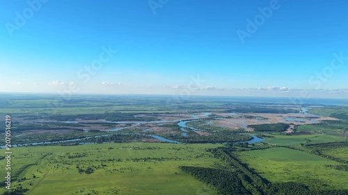 Aerial view to the river in flight