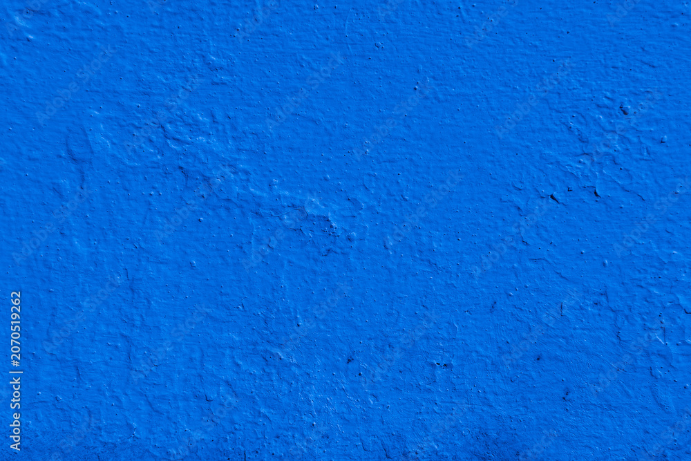 Fototapeta premium Deep blue textured background with rough surface
