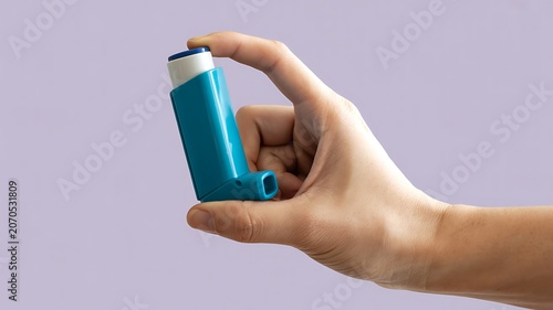 Asthma inhaler, blue medication inhaler, handheld respiratory device, healthcare product