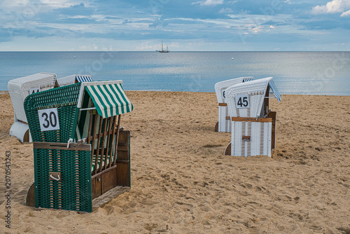Beach chairs on the empty beach of Boltenhagen on the Baltic Sea in the evening