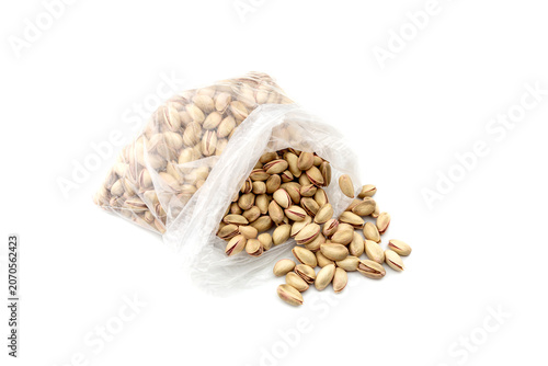 Fresh pistachios on a white background close-up