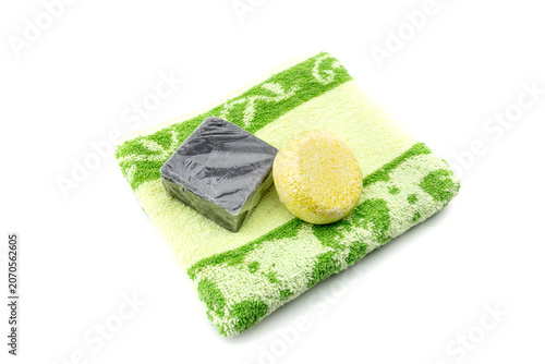 Close-up of cosmetic and bath accessories on a white background