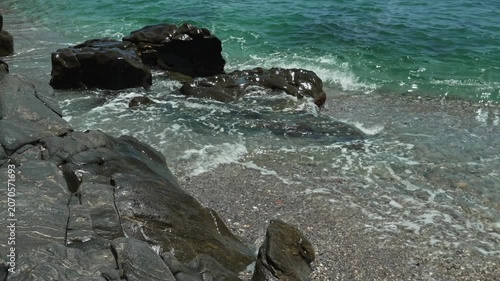 Waves rolling onto the beach, Playa de Calaceite, near Torrox Costa, Andalusia, Spain