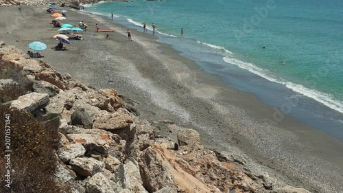 Waves rolling onto the beach, Playa de Calaceite, near Torrox Costa, Andalusia, Spain