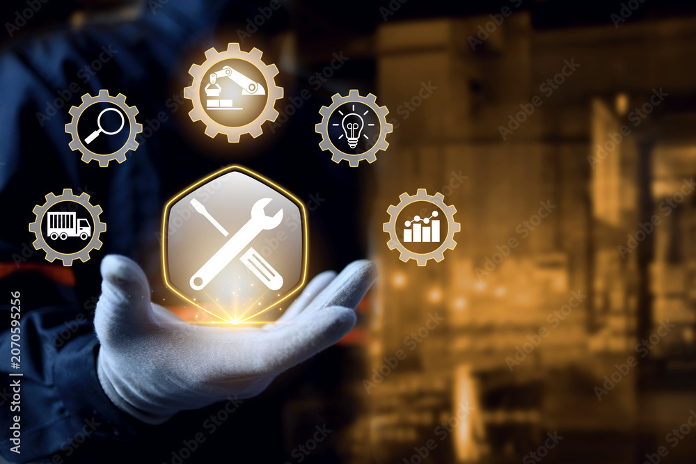 Obraz premium Maintenance concept with engineer holding a tools to inspection or planning of machinery service intervals periods and corrective and preventive maintenance