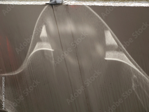 Abstract form of light on the grunge wall.