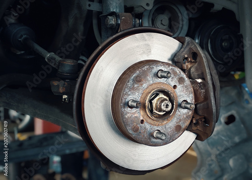 Newly resurfaced and smooth car brake disc rotor after machining