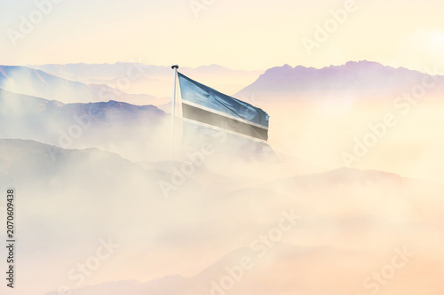Fényképezés Botswana national flag hide in beautiful clouds