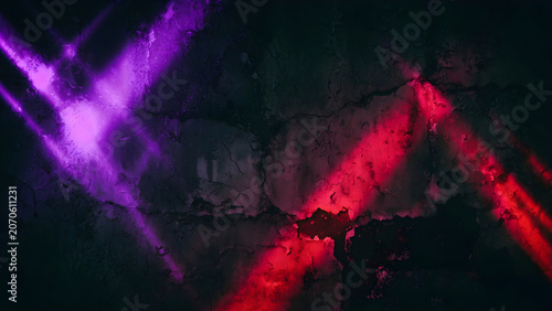 Bright purple and red light beams in dark night