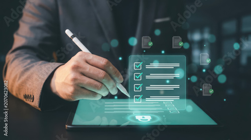 Businessman digital tablet checklist on screen for secure online verification process
