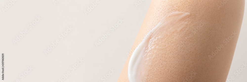Fototapeta premium Cosmetic moisturizer applied on healthy skin in close up, skincare routine, hydration, beauty treatment, dermatology