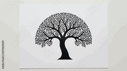 A detailed black silhouette of a large deciduous tree with many leaves on white.