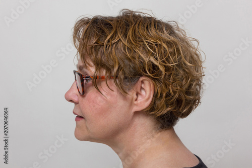 Side view profile portrait of mature woman for reference dataset.