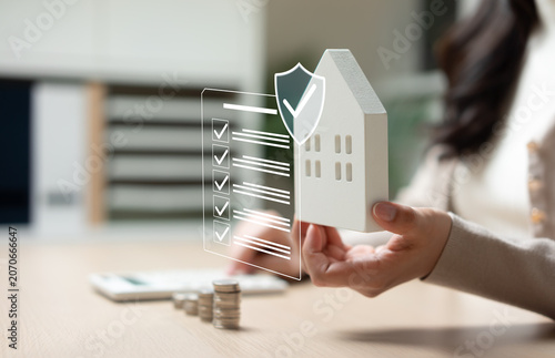 Konstfotografi Home insurance protection concept with house model, security checklist and financial planning