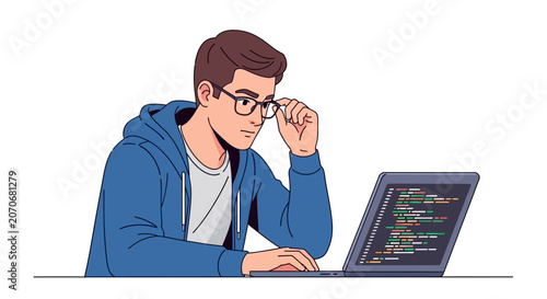 Young programmer wearing glasses working on a laptop with code.