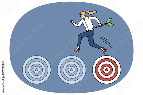 Purposeful woman shows ambition and motivation to achieve goals, jumping on dartboards. Purposeful female manager overcomes difficulties along way, moving forward along career ladder