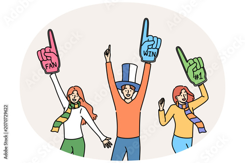 Group of fans raise hands in air, chanting slogans to support football team at sports tournament. Fans with accessories for visiting stadium and moral assistance to players fighting for champion title