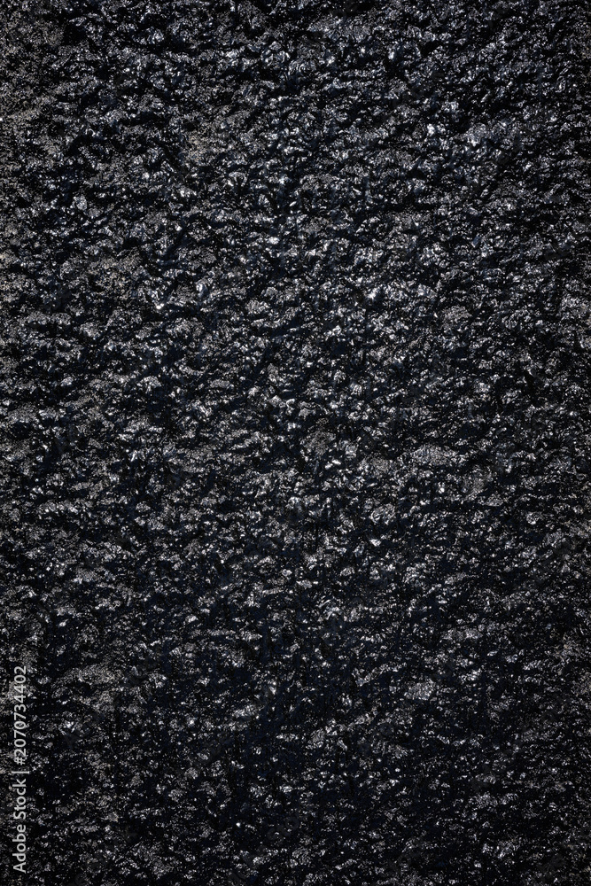 Fototapeta premium Newly tarred pavement, ready to be asphalted