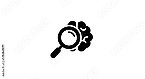 Photos Magnifying glass on a brain.