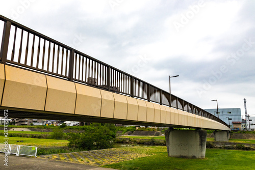 Modern pedestrian bridge over river