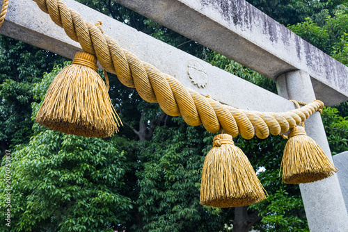 Shimenawa rope on shrine torii gate