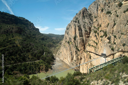 End of Caminito del Rey hiking trail, rope bridge attached to steep cliff walls in El Chorro, Spain