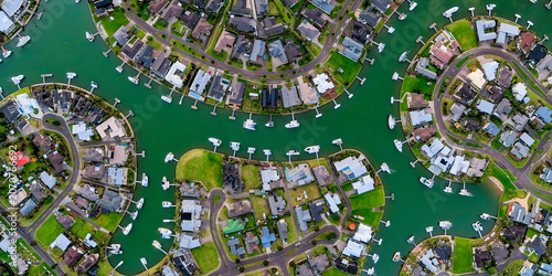 Schilderij op canvas Aerial view of the waterfront yacht villa area, a high-end community in New Zeal
