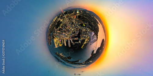 Spherical panoramic aerial shot of Auckland's bustling harbour at sunset