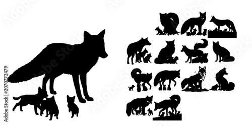 Foto Fox With a Bushy Tail Curled Around Pups Silhouette