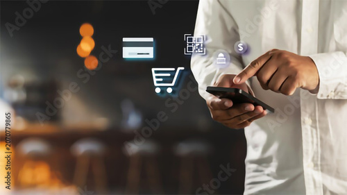 Person using smartphone for mobile payment and online shopping with digital business icons in a modern cafe setting