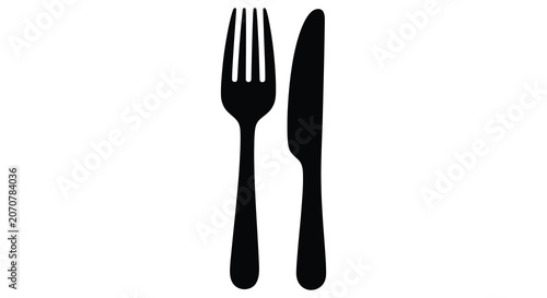 Fork And Knife Silhouette Against A White Background