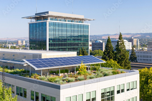 Modern office building with rooftop solar panels and green roof promoting sustainable urban architecture