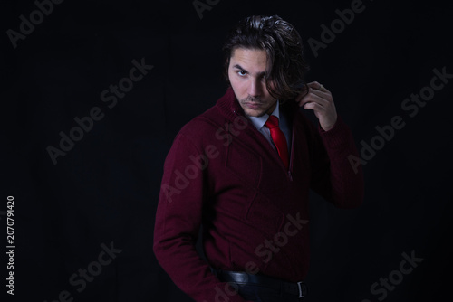 Tableau sur toile Horizontal fashion portrait ofa young man, creating a casual yet elegant visual,