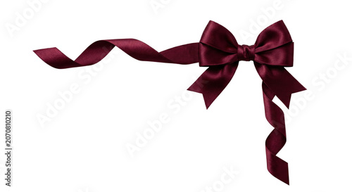 Konstfotografi Dark red burgundy satin ribbon bow with curly tail