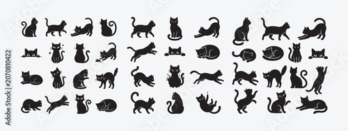 Fotografie Collection of black cat silhouettes in various poses and sizes on light gray bac
