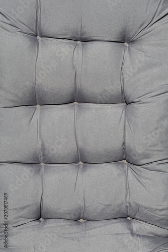 Canvas Print Gray tufted upholstered cushion surface with stitched square textile pattern