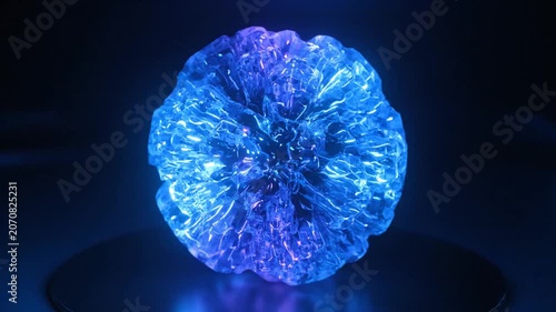 Abstract Blue Crystal Energy Orb Rotating with Light Effects