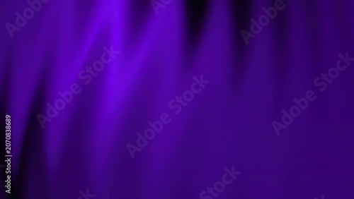 Purple stage lights shining in a dark concert setting