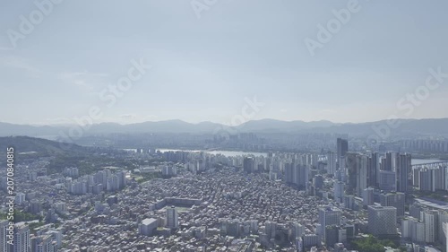 Aerial Drone View of Cityscape and Vibrant Commercial Area near Konkuk University Station in Seoul, South Korea