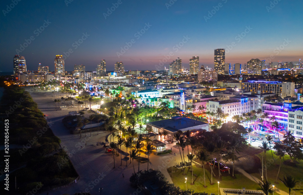 Fototapeta premium Miami night coastline from drone. Miami ocean shore at night. Miami shoreline. Panoramic Miami evening coastline.