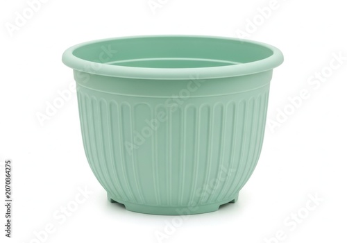 A Simple Light Green Plastic Flower Pot Against A Clean White Background