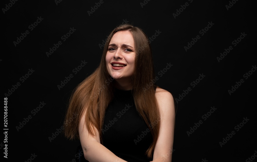 Naklejka premium Woman expressing strong disgust or disbelief with a grimace, having a skeptical and adverse facial expression