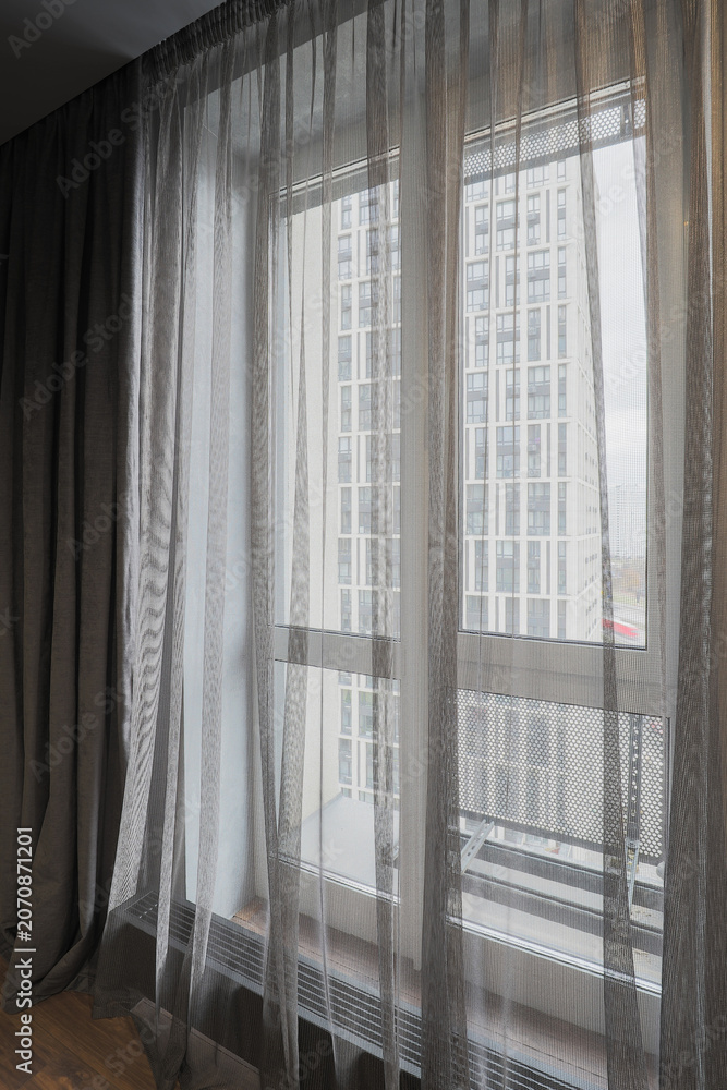 Obraz premium Window with sheer curtains and view