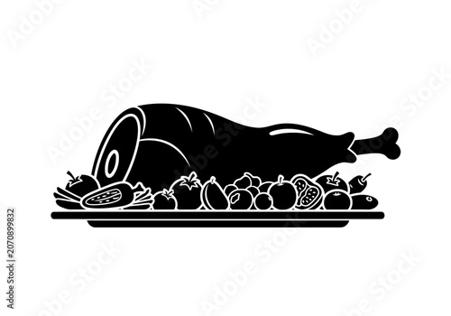 A yummy black silhouette of a perfect roasted lamb leg with many vegetables on a large platter