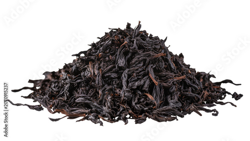 Photos Isolated pile of dried loose leaf black tea, natural ingredient for aromatic hot