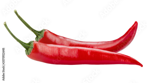 Cuadro en lienzo Isolated two fresh vibrant red hot chili peppers with green stems, an essential