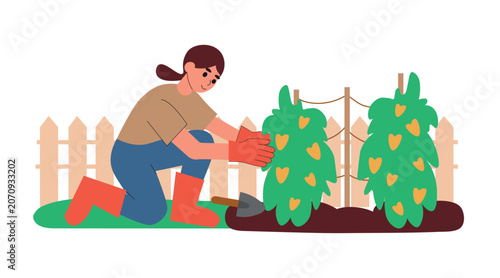 Obraz na plátně A young woman takes care of the fruit-bearing plants in her garden, which is enclosed by a fence