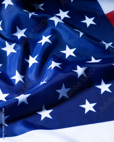 Patriotic american flag fabric with stars and waving folds